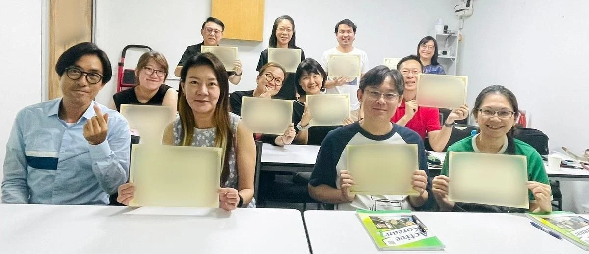 A Korean Explorer class celebrating finishing their level