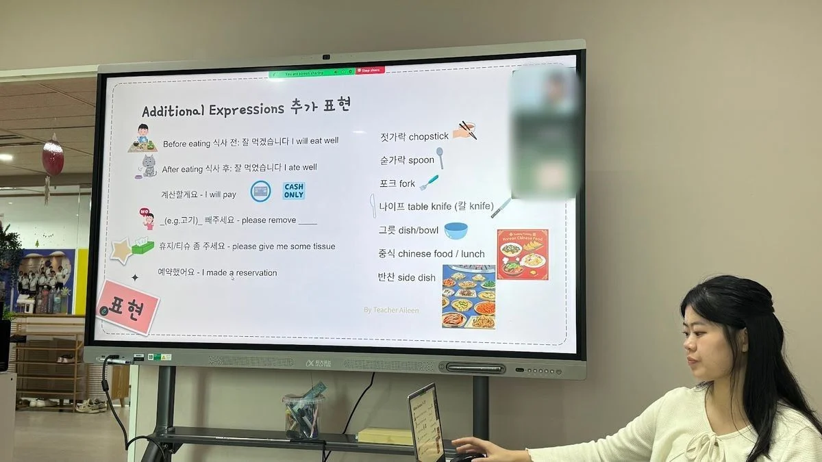 A Korean Explorer teacher taking an online lesson through everyday expressions