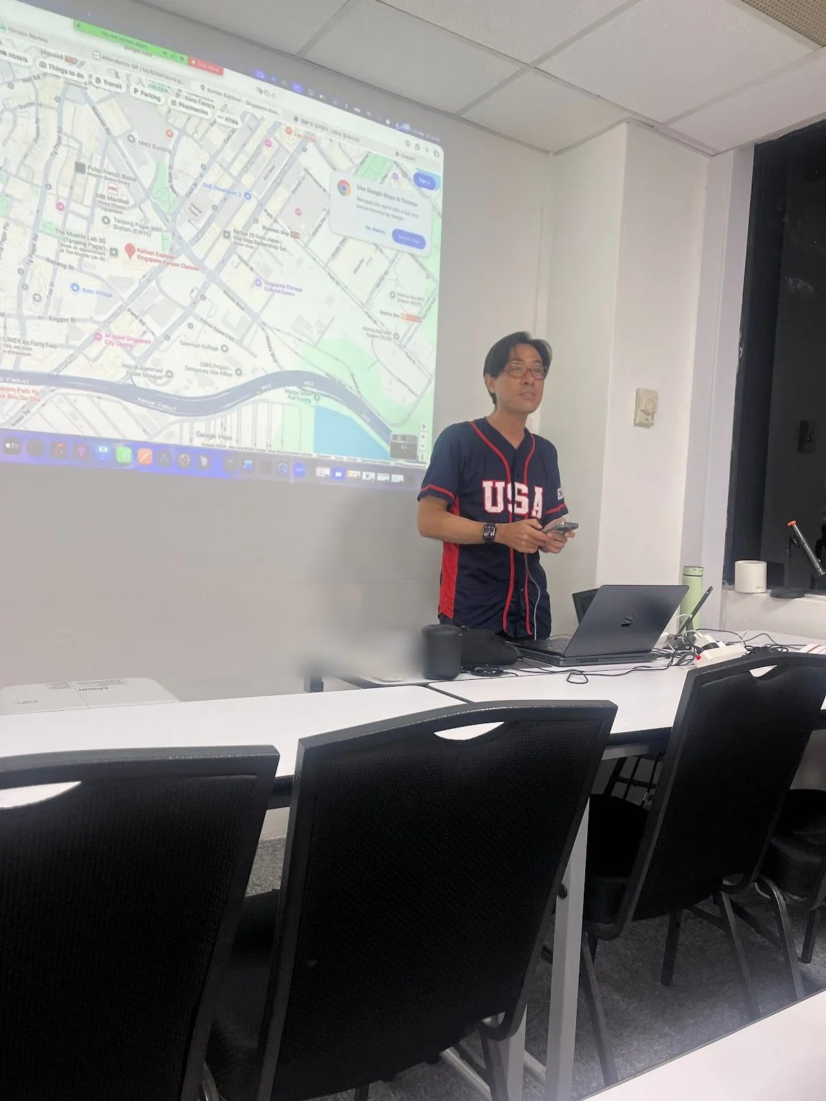 A Korean Explorer teacher presenting during a lesson